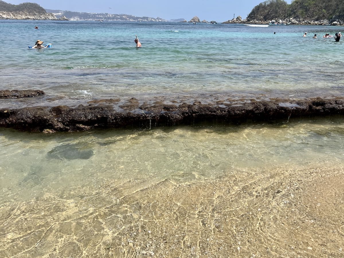 People snorkeling at La entrega Beach in Huatulco. 