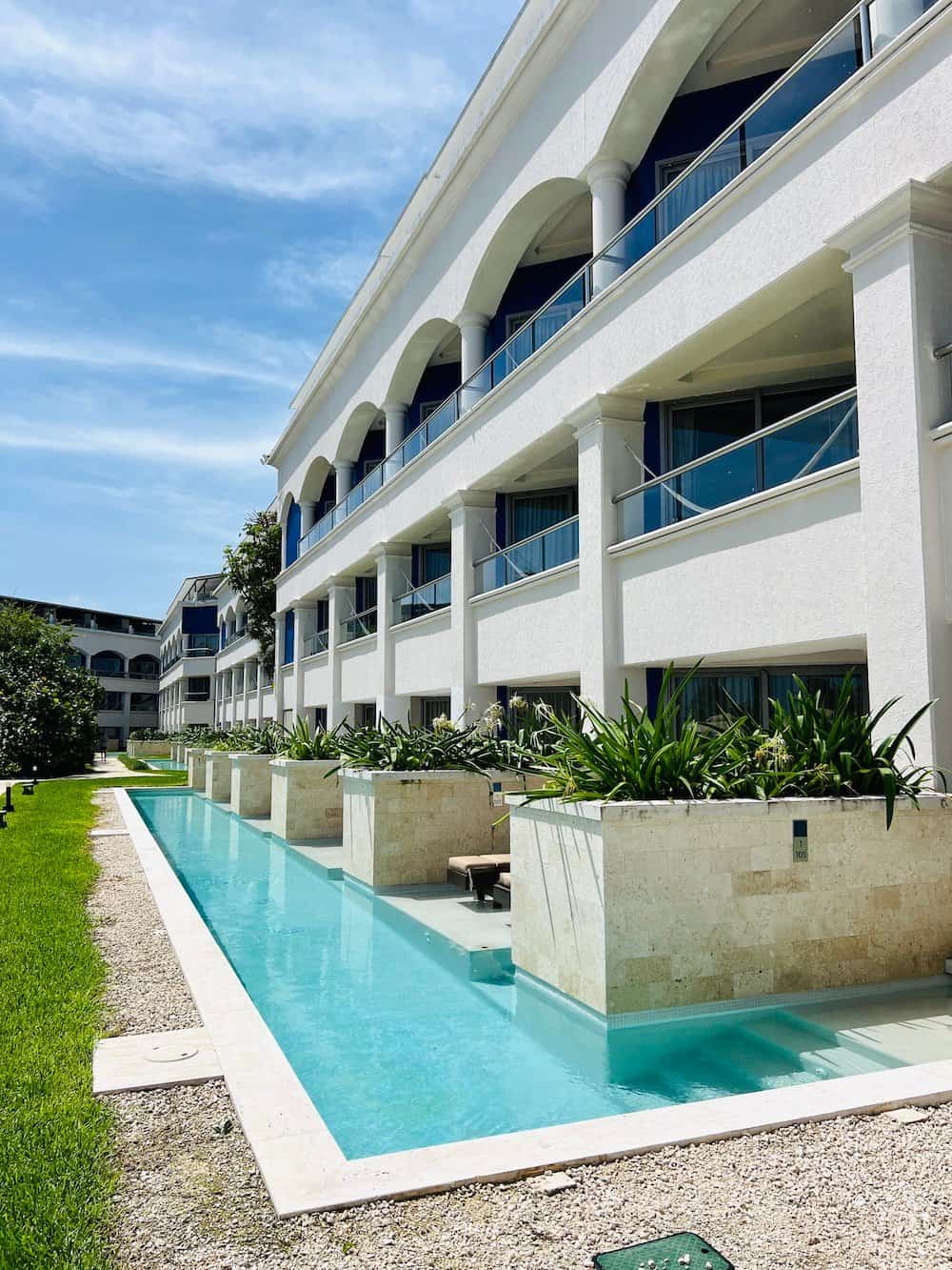 Swim-out suites at Heaven with hammocks visible on upper floors. 
