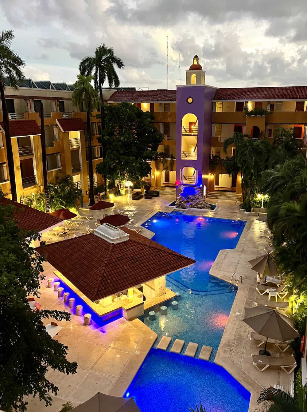 Swimming pool at night at Hacienda Adhara Cancun. 