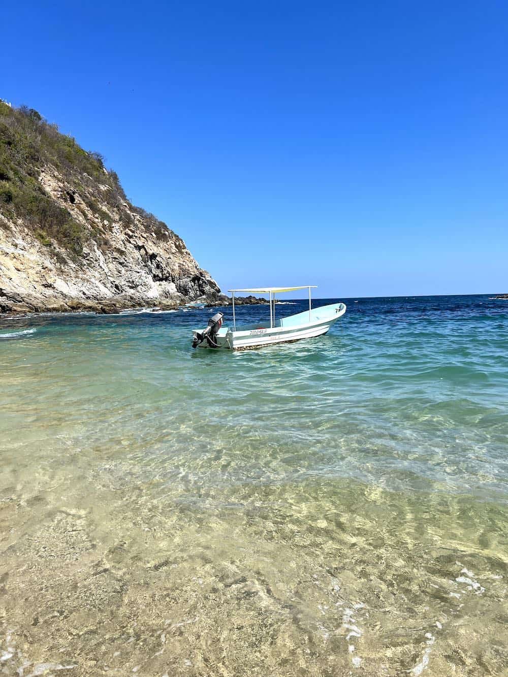 Tour boat in Bahia Estacahuite. 
