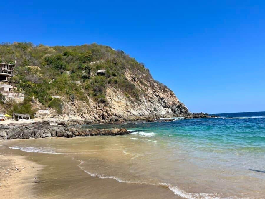 Middle and left beaches at Estacahuite on a sunny day. 