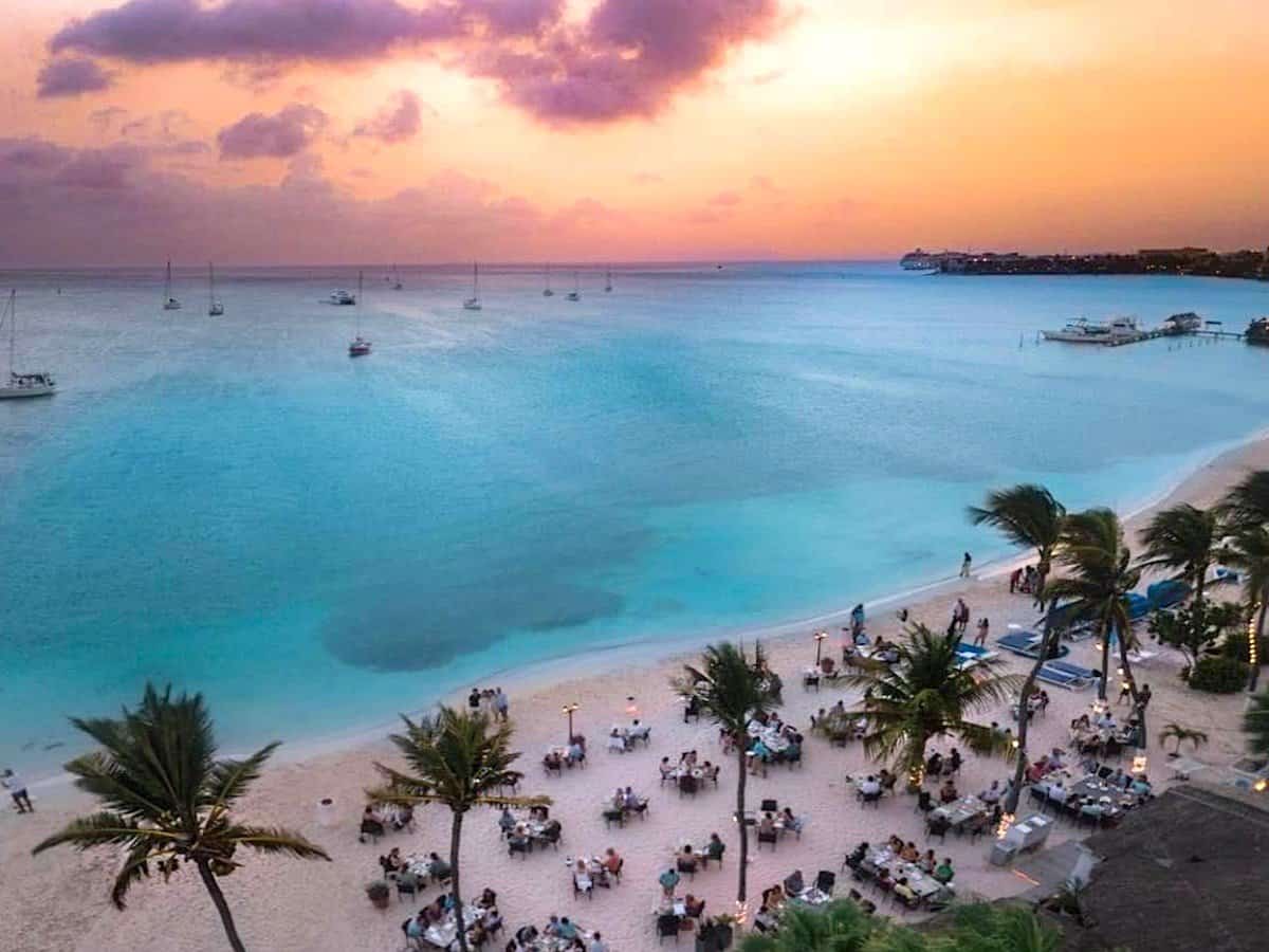 Sunset scene near Oranjestad Aruba at Barefoot restaurant. 