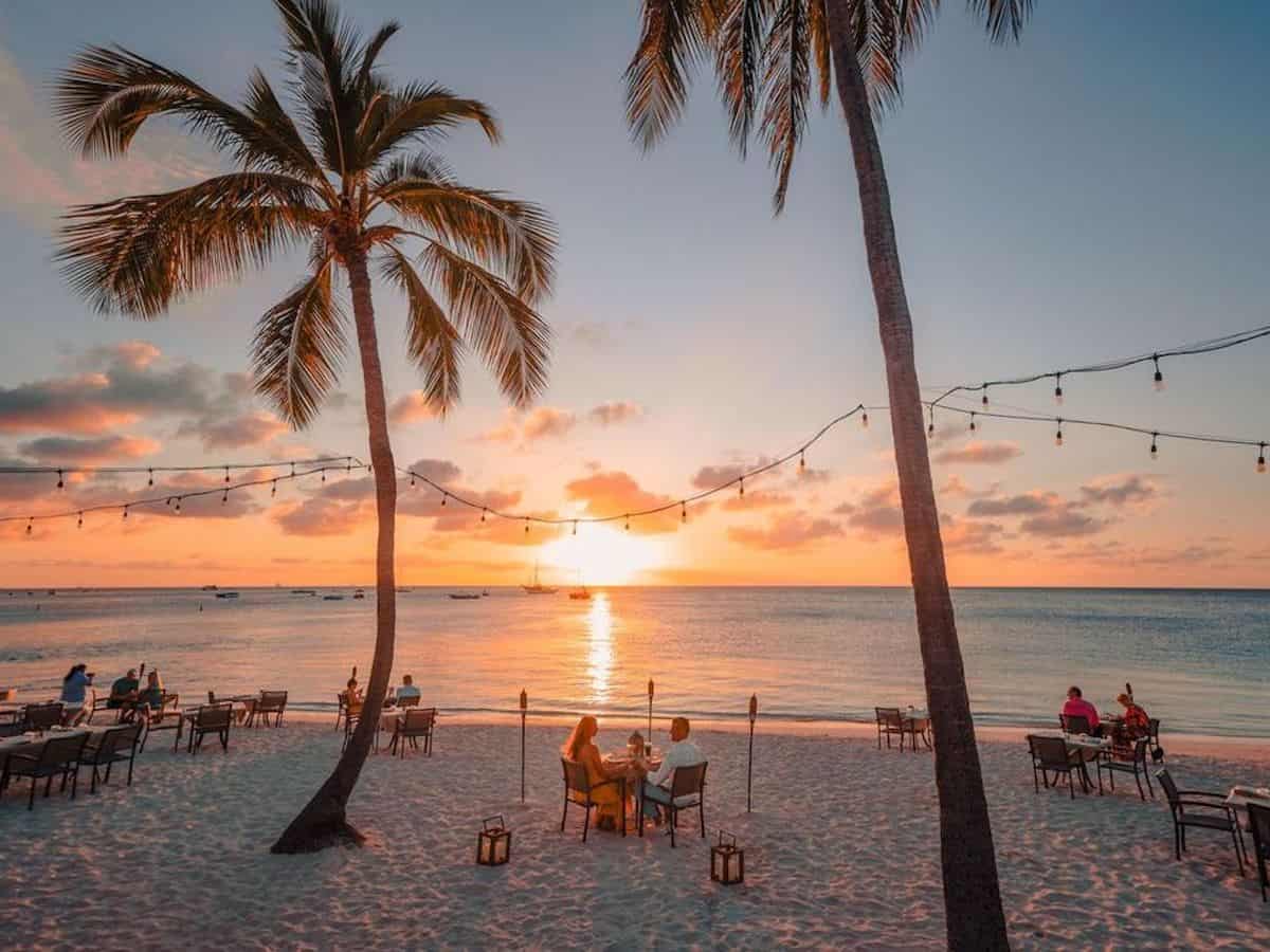 Atardi restaurant on Palm Beach at sunset in Aruba. 