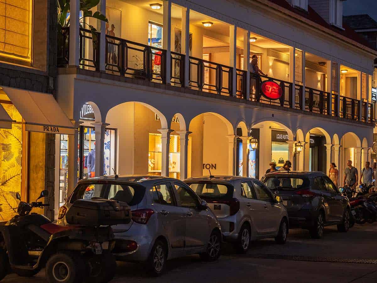 Designer shops such as Prada in Gustavia at night.