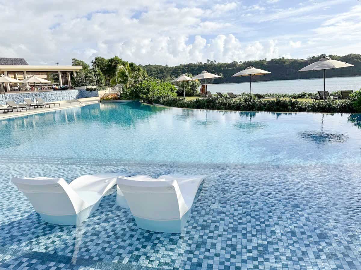 Lounging poolside at Six Senses La Sagasse. (Credit: Jennifer Bain)