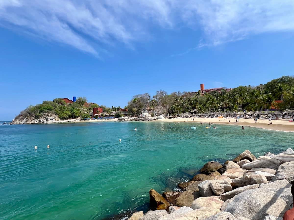 People swimming at the beach at Las Brisas Resort in Huatulco. 