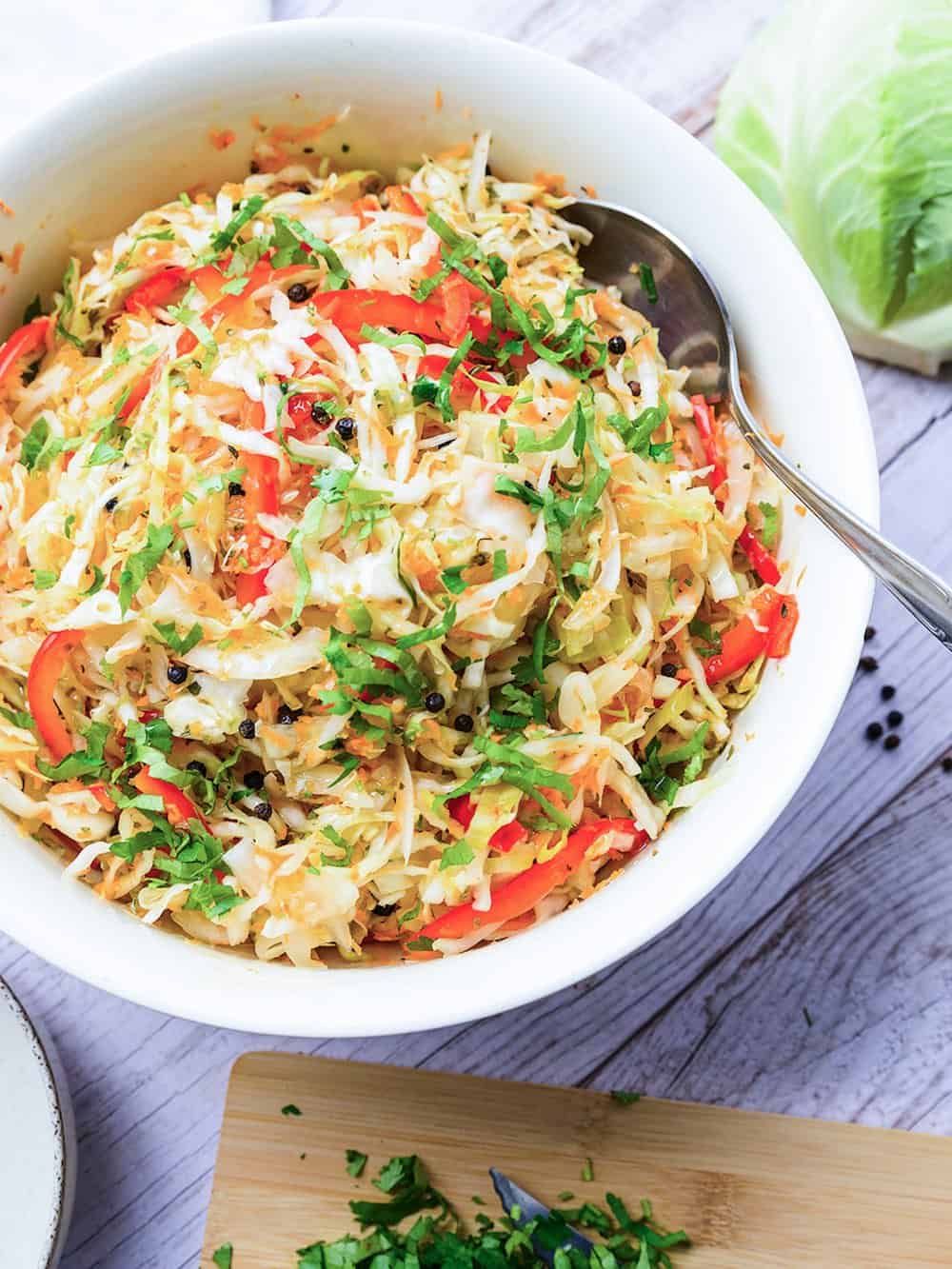Overhead shot of a bowl of Guatemalan cabbage slaw. 